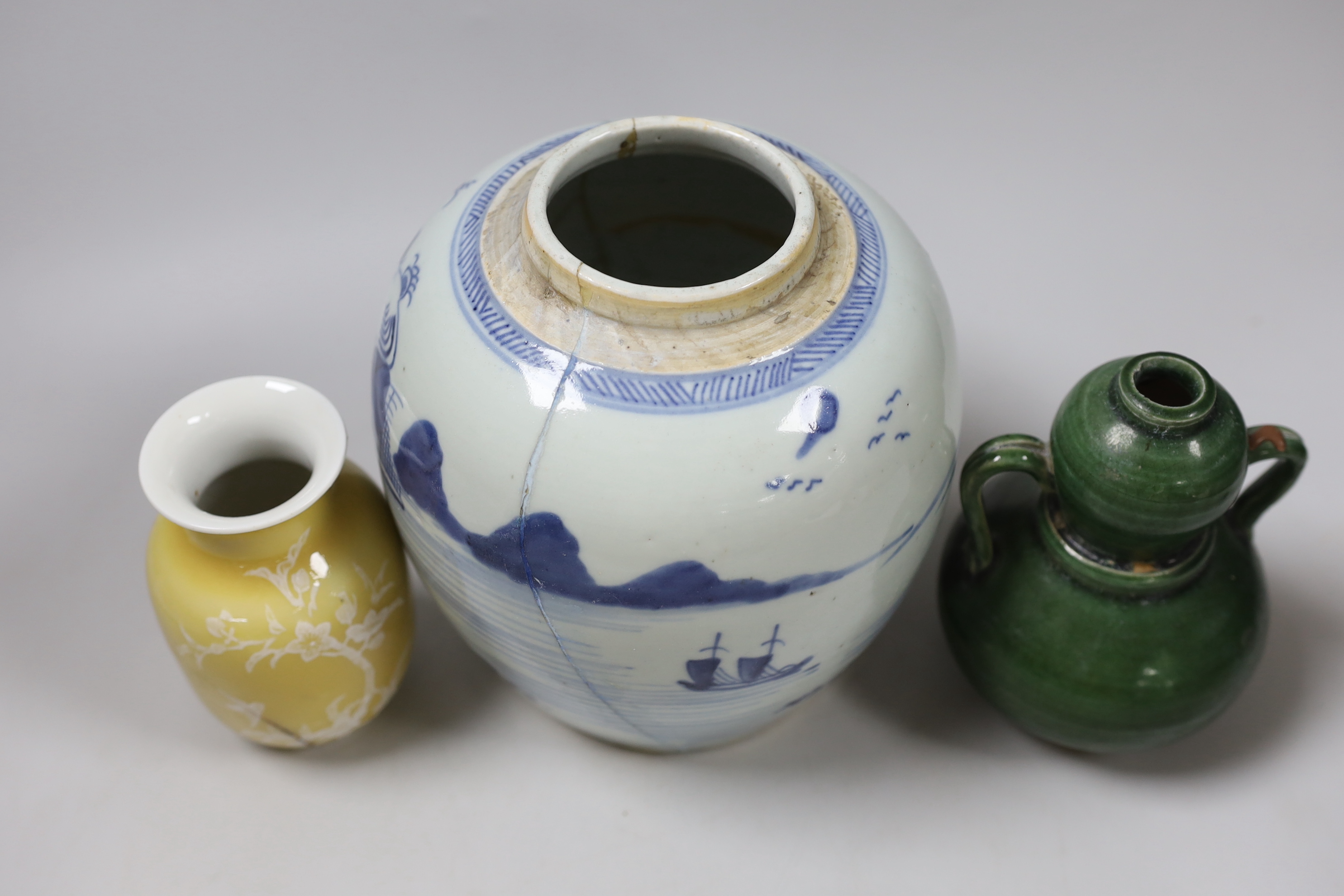 A Chinese blue and white vase, together with a Chinese green two handled double gourd vase and another, tallest 19cm